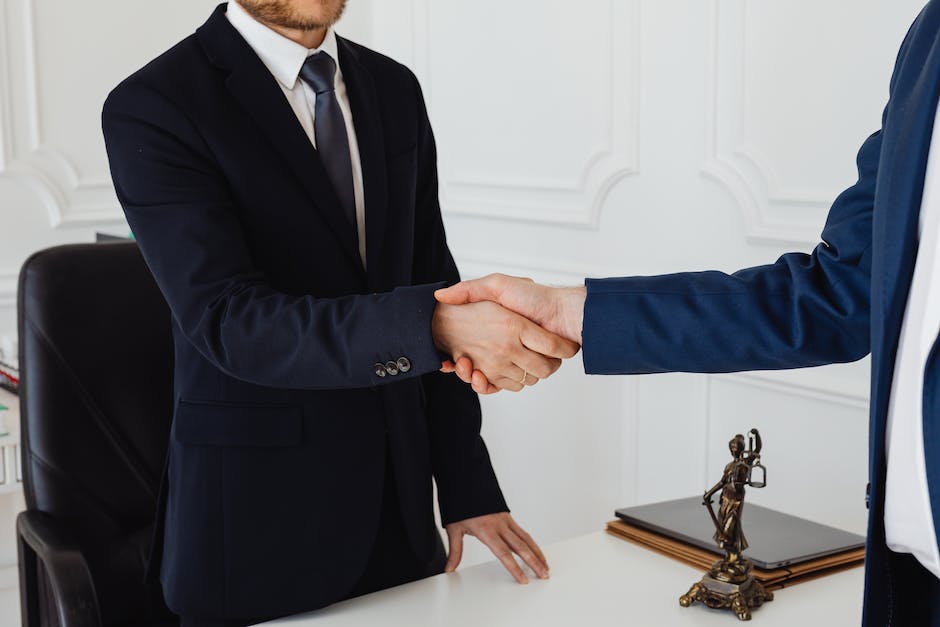 Illustration of a landlord and tenant shaking hands with a shield symbolizing financial protection between them.