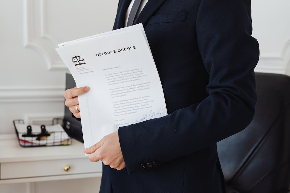 Image of a person holding a document with the words 'landlord licensing' written on it.